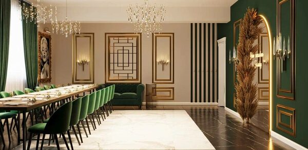 Голливуд. Элегантный лофт в зелено-бежевых оттенках. Большое помещение с длинным обеденным столом, окруженным зелеными стульями. Зеленые шторы на окнах, декоративные элементы на стенах, включая зеркала и картины. Потолочные люстры и настенные светильники. Темный пол с мраморной отделкой.