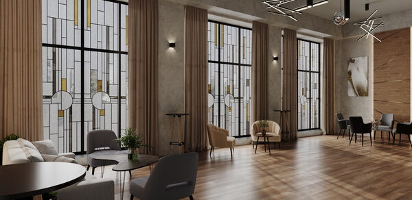 Лофт Мираж. Просторное помещение с высокими окнами в витражном стиле, серыми и бежевыми креслами, деревянным полом, декоративными светильниками на потолке. Стены серые с текстурой. Есть небольшие круглые столики и стены украшены картинами.