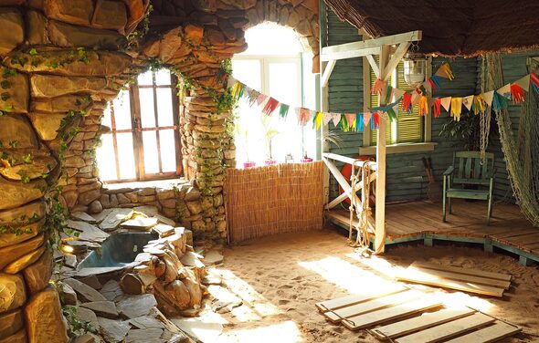 Studio with sea sand and waterfall