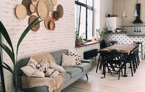 Loft with kitchen in white brick