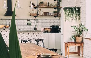Loft with kitchen in white brick