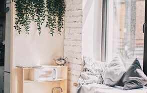 Loft with kitchen in white brick