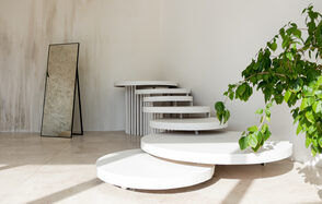 White hall with a staircase and a panoramic window